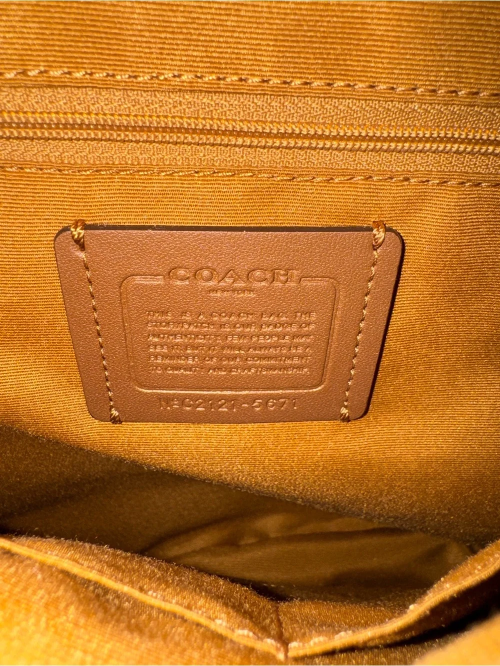 Coach Brown Signature Canvas Backpack with White Leather Pocket